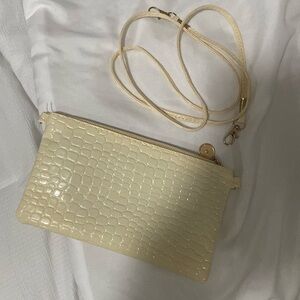 Cream color bag with strap